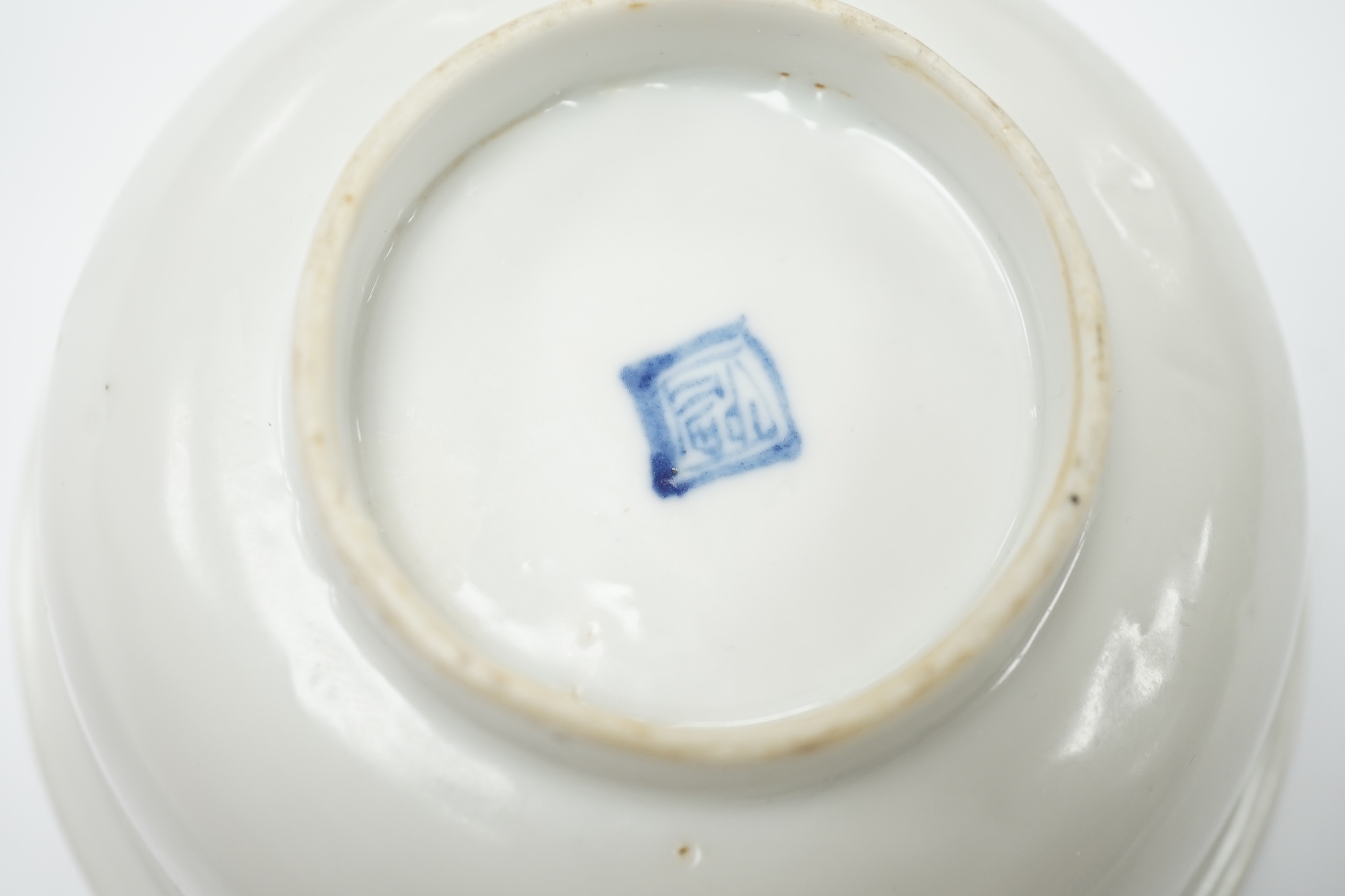 A Chinese late Ming white glazed bowl, underglaze blue seal mark, 14cm in diameter